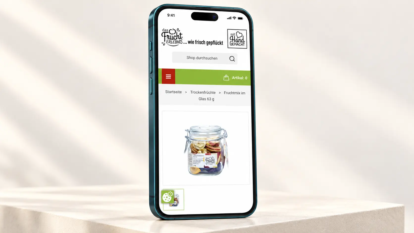 Smartphone mit der mobilen Produktansicht von fruchterlebnis.at.